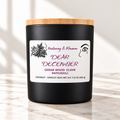 Dear December Signature candle on bright ivory marble tabletop