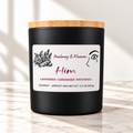 HIM candle in matte black jar on ivory marble with white background