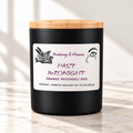 Past Midnight Signature candle on bright ivory marble tabletop