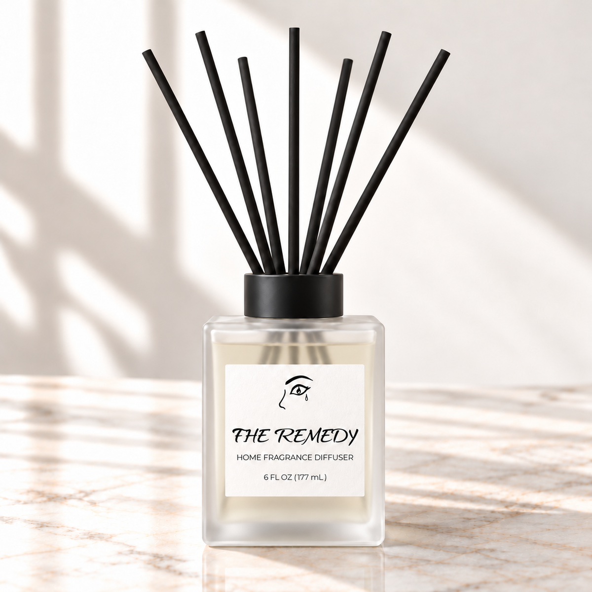 The Remedy white sage and lavender home diffuser with front label